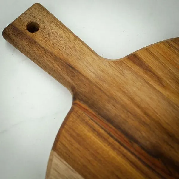 Brown_Wooden_Chopping_Board_With_Handle_42X30_Cm_Round_Mango_Wooden_Cutting_Board_For_Kitchen,_Serving_Fruits_&_Vegetables_|_Kitchen_Safe_&_Stylish