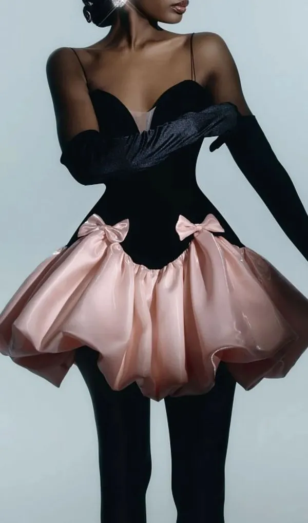 Ekeshwara_Bow-Accented_Asymmetric_Bubble_Mini_Dress_–_Velvet_Black_&_Rose_Pink|_Model_Height_5.8inch_,_Fabric_All_Way_Stretchable