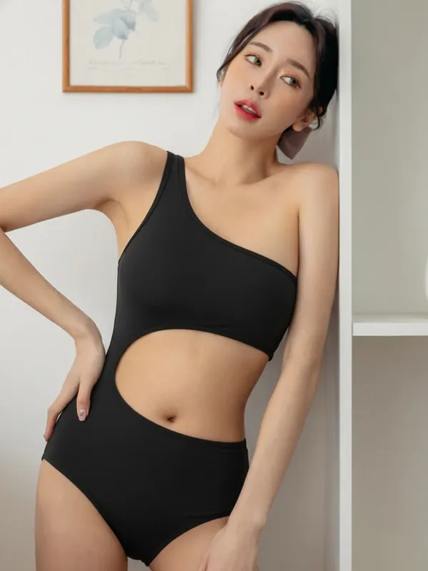 Ekeshwara_Women's_Black_One_Shoulder_Cut-Out_Bodysuit|_Model_Height_5.8inch_,_Fabric_All_Way_Stretchable