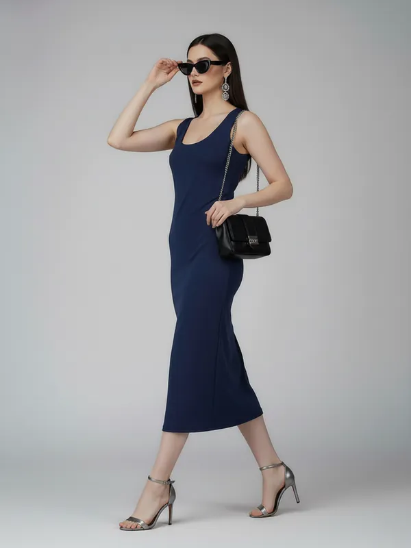 Elegant_Blue_Sleeveless_Midi_Dress_with_Side_Cut-Outs_&_Slit_??Perfect_for_Chic_Evenings|_Model_Height_5.8inch_,_Fabric_All_Way_Stretchable