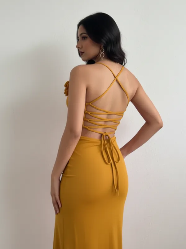 Mustard_Yellow_Strappy_Backless_Maxi_Dress_With_Floral_Shoulder_Detail_For_Women|_Model_Height_5.8inch_,_Fabric_All_Way_Stretchable