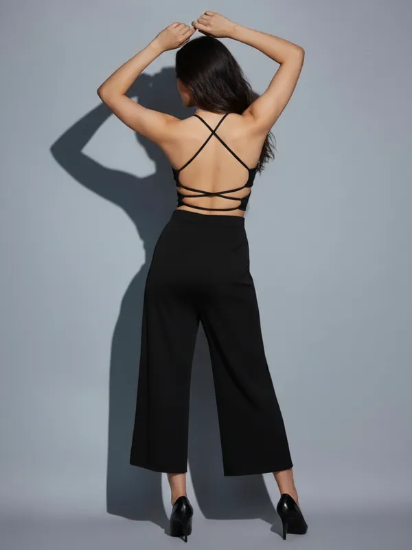 Black_Solid_Backless_Jumpsuit_For_Women|_Model_Height_5.8inch_,_Fabric_All_Way_Stretchable