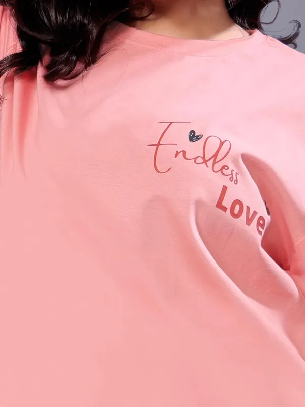 Peach_Printed_Cotton_Top_Stylish_And_Comfortable_Design,_Everyday_Wear,_And_Trendy_Fashion_Statements_Regular_Fit_T-Shirt_For_Women