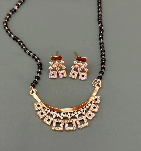 Royal_Curve_Design_Mangalsutra_Adorned_with_Sparkling_Square-Cut_Stone_Charms