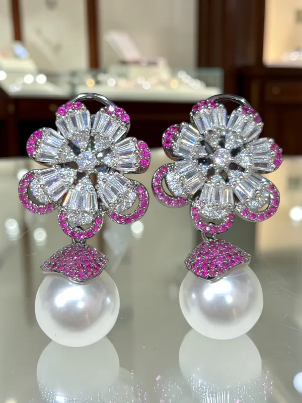 Next_to_real_diamond_dropping_studs_for_women_