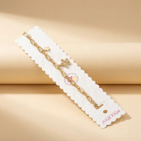 Gold-Toned_Chain_Bracelet_With_Floral_Charms
