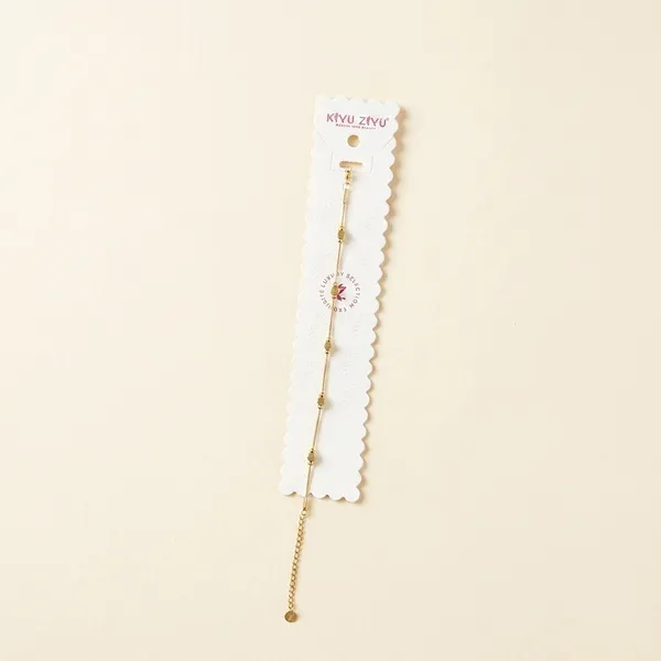 Golden_Chain_Bracelet_With_Beads_And_Charm