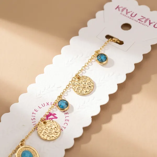 Golden_Chain_Bracelet_With_Crystal_And_Textured_Disc_Charms