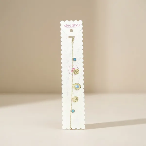 Golden_Chain_Bracelet_With_Crystal_And_Textured_Disc_Charms