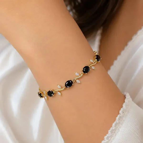 Elegant_Gold_Tulip_Flower_Bracelet_–_Black_&_White_Edition