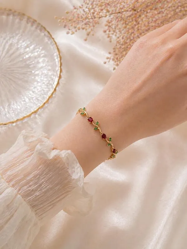 Elegant_Gold_Tulip_Flower_Bracelet_–_Ruby_Red_&_Green_Edition