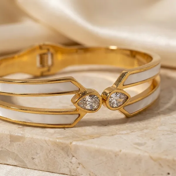 Elegant_Gold-Toned_Bracelet_With_Black_Stone_Accents