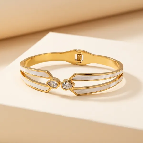 Elegant_Gold-Toned_Bracelet_With_Black_Stone_Accents