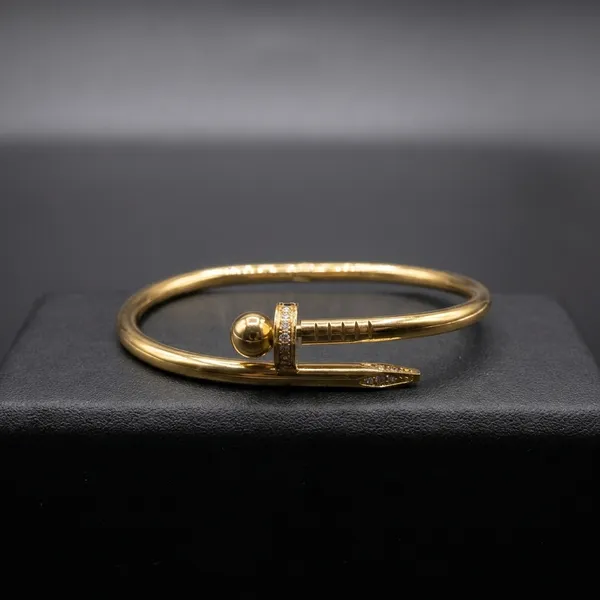 Gold-Plated_Nail_Bracelet_With_Diamond_Accents