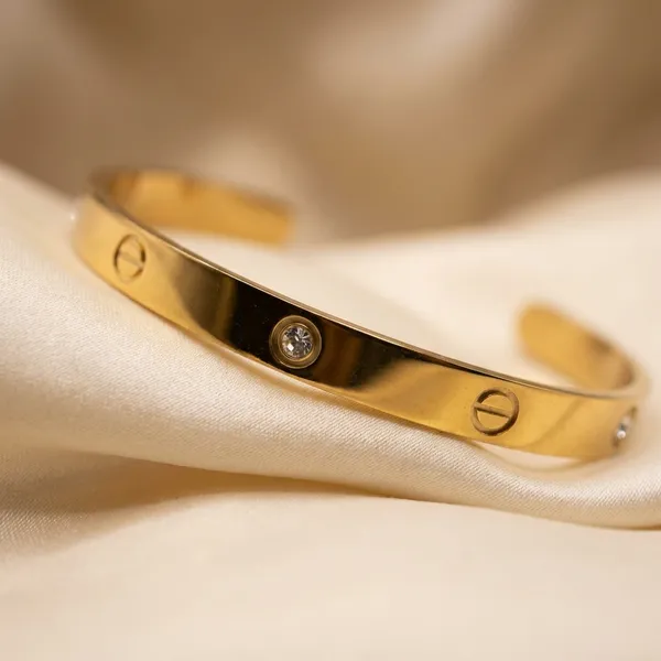 Gold-Toned_Screw_Design_Stainless_Steel_Cuff_Bracelet