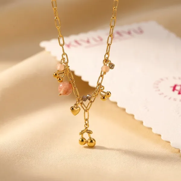 Gold-Toned_Charm_Necklace_With_Mushroom_And_Crystal_Accents