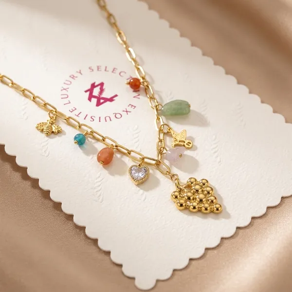 Multi-Charm_Gold-Tone_Layered_Chain_Necklace_With_Colorful_Stone_Accents