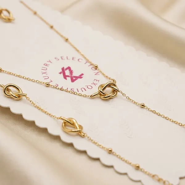 Gold-Tone_Knotted_Chain_Jewelry_Set_With_Earrings,_Bracelet,_And_Lariat_Necklace