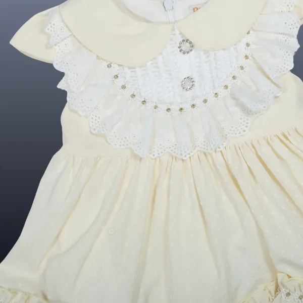 Cream_Floral_Print_Layered_Dress,_Ruffled_Design_With_Pom_Pom_Trim_And_Floral_Bow