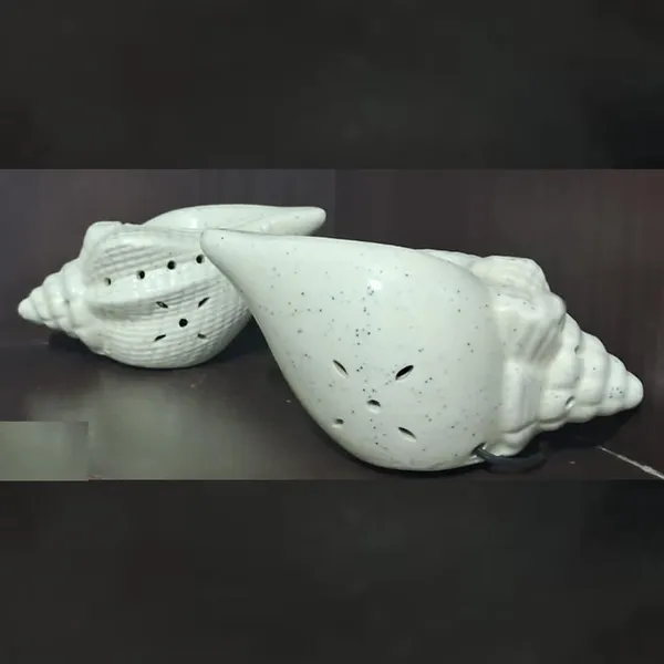 Handicrafts_Fragrance_Ancient_Shankh_Shape_Ceramic_Electric_Aroma_Diffuser_Oil_Burner_|_Electric_Diffuser_Burner_With_Oil_For_Room/Office/Home_Decor_(Arm-Snk2)