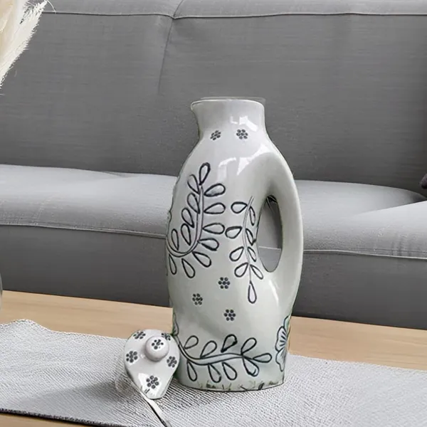 Ceramic_Oil_Dispenser_For_Kitchen_Stylish_White_Flower_Design_Design_For_Cooking_Oil_Vinegar_100%_Food_&_Microwave_Safe_(White)