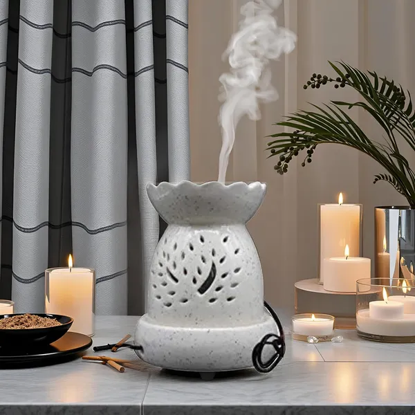 Ceramic_Electric_Aroma_Oil_Ceramic_Diffuser_Burner_In_Matka_Shape_With_Electric_Bulb_And_Oil_Glossy_Finish_Height_11_Cm_(White)
