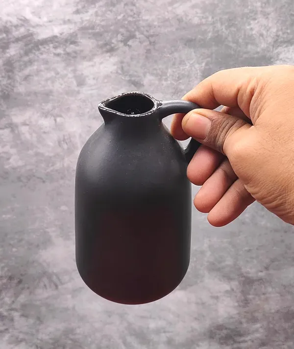 Ceramic_Flower_Vase_In_Bottle_Shape_Stylish_Bottle_Shape_Design,_Ideal_For_Office_And_Living_Room_Centerpieces,_Elegant_Pot_For_Modern_Home_Decor,_Perfect_For_Any_Table_(Black)