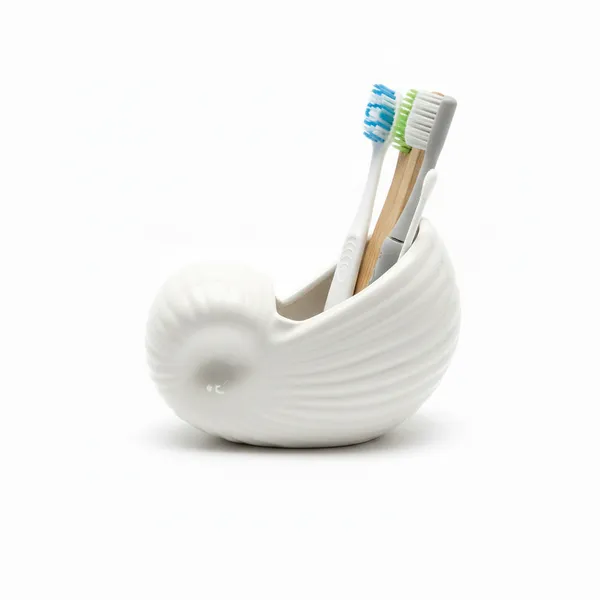 Kraftlik_Handicrafts_Ceramic_Toothbrush_Holder_for_Bathroom_|_Decorative_Design_Toothbrush_Stand_|_Glazed_Bathroom_Counter_Organizer_|_Toothpaste_&_Brush_Holder_|_Pack_of_1_(SEEP_White)