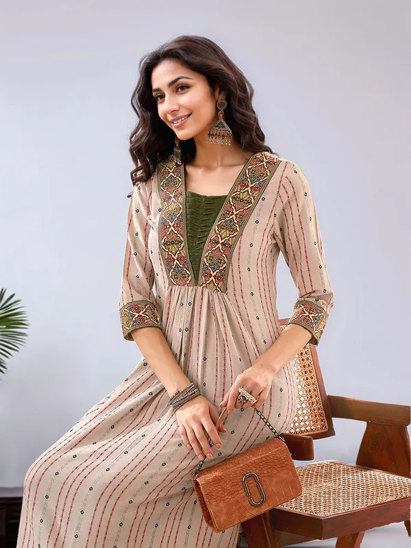 Women_Beige_Pure_Cotton_Handloom_Woven_V-Neck_A-line_Kurta_Set_with_Lace_Detailing