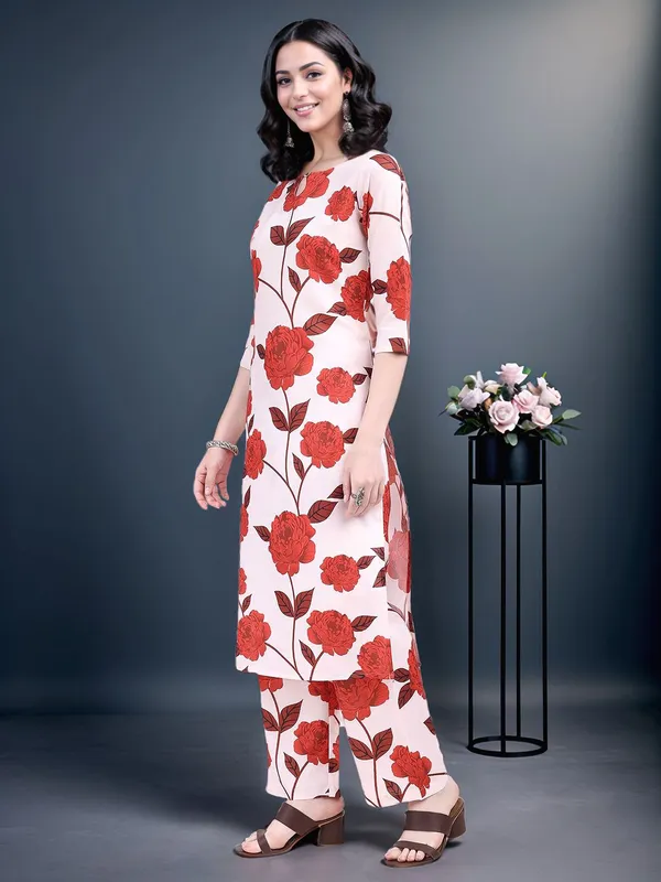 Women_Cream_&_Red_Floral_Printed_Keyhole_neck_Kurta_with_Trousers