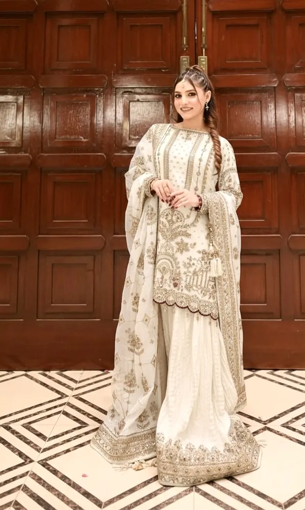 DESIGNER_PARTY_WEAR:_HEAVY_FAUX_GEORGETTE_TOP,_PLAZZO,_AND_DUPATTA_SET