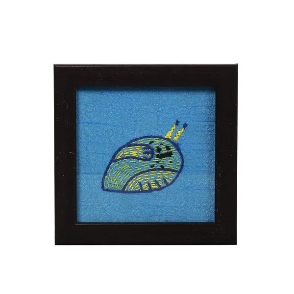 Indha_Hand_Embroidered_Glass_Coasters_–_Set_of_2_Handmade_Decorative_Drink_Coasters_for_Coffee_Table,_Dining,_and_Gifting_(Blue_Dupion_Snail)