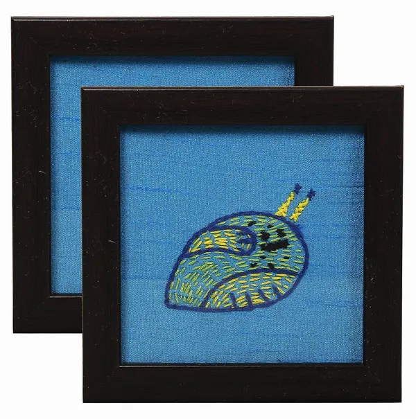 Indha_Hand_Embroidered_Glass_Coasters_–_Set_of_2_Handmade_Decorative_Drink_Coasters_for_Coffee_Table,_Dining,_and_Gifting_(Blue_Dupion_Snail)