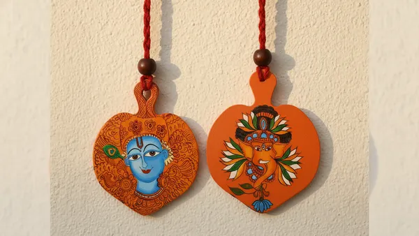 Indha_Hand-Painted_Wall_D�cor_Set_|_Krishna_and_Ganesha_Wooden_Hanging_with_Silk-Braided_Cord_|_Handmade_Home_D�cor_and_Gift_Item_|_Made_in_India
