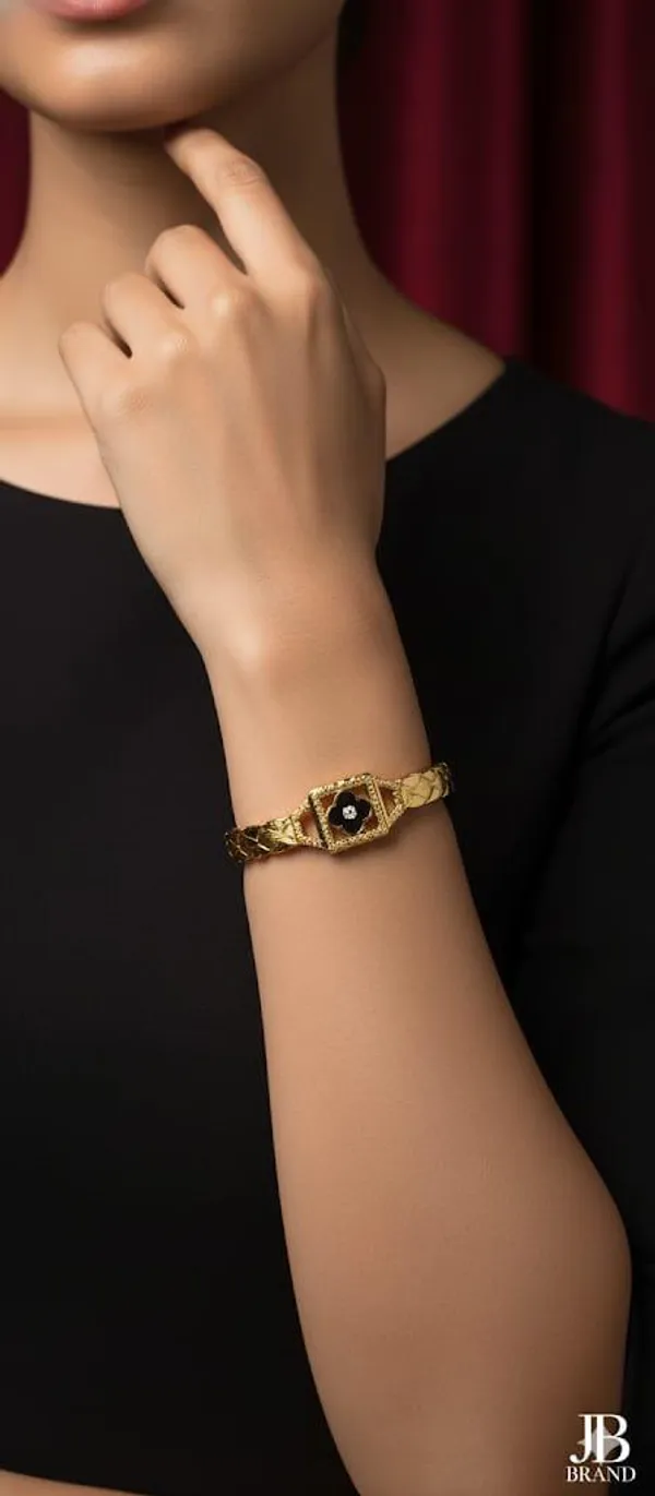 Golden_Textured_Bangle_With_Central_Black_Stone_And_Crystal_Halo