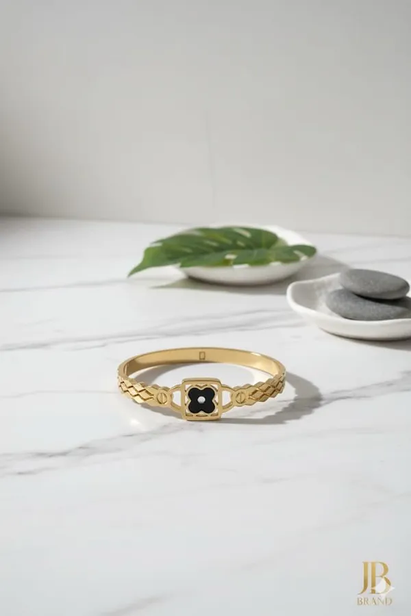 Golden_Textured_Bangle_With_Central_Black_Stone_And_Crystal_Halo