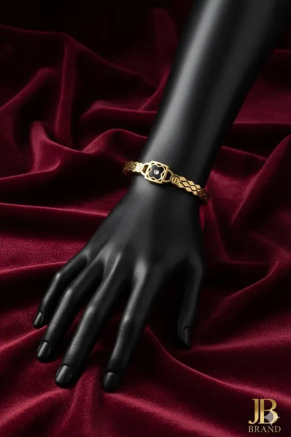 Golden_Textured_Bangle_With_Central_Black_Stone_And_Crystal_Halo