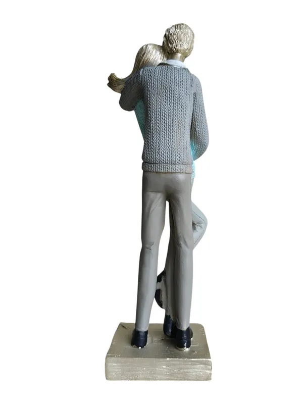 COUPLE-BLU:_Blue_Sweater_Embrace