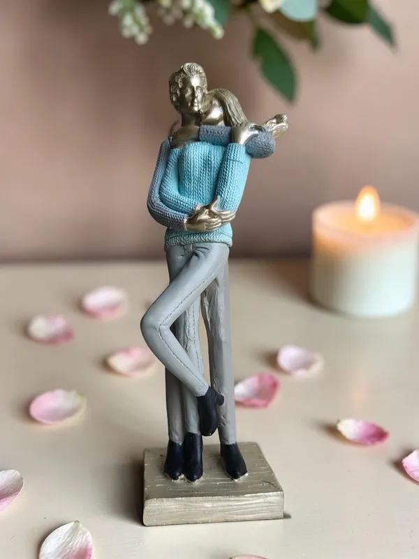 COUPLE-BLU:_Blue_Sweater_Embrace