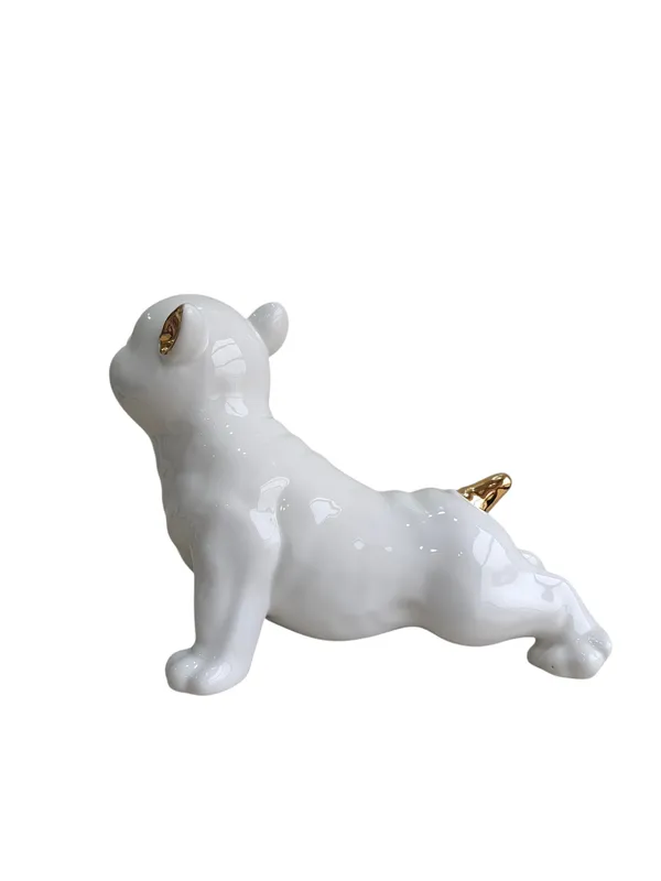 Glossy_White_Ceramic_Puppy_Figurine_with_Golden_Accents