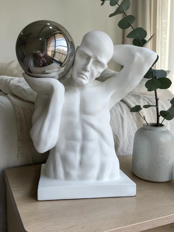 Atlas_Strength_Sculpture_with_Chrome_Sphere