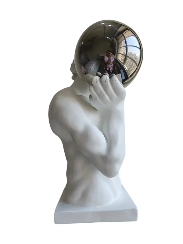 Atlas_Strength_Sculpture_with_Chrome_Sphere