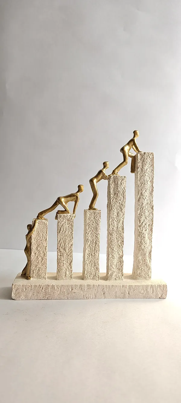5_men_climbing_on_pillers
