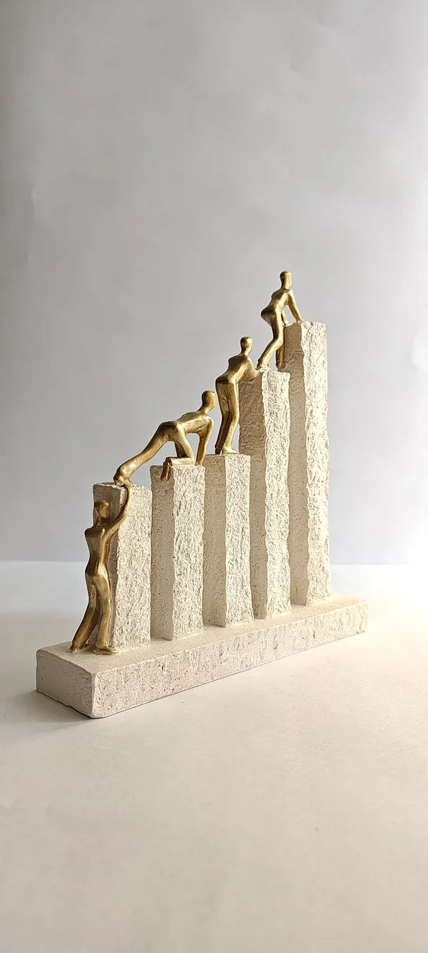 5_men_climbing_on_pillers