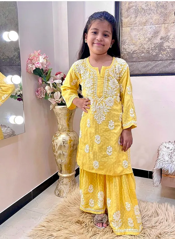 Yellow_New_Designer_Heavy_Rayon_Cotton_Top_with_Sharara_For_Girls
