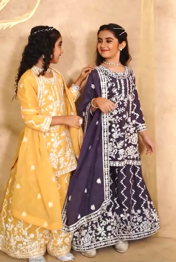 Yellow_Designer_Wear_Top_With_Sharara_And_Dupatta_Set_For_Girls