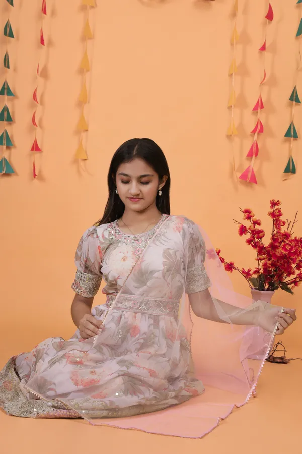 Cream_New_Designer_Heavy_Faux_Georgette_Gown_For_Girls
