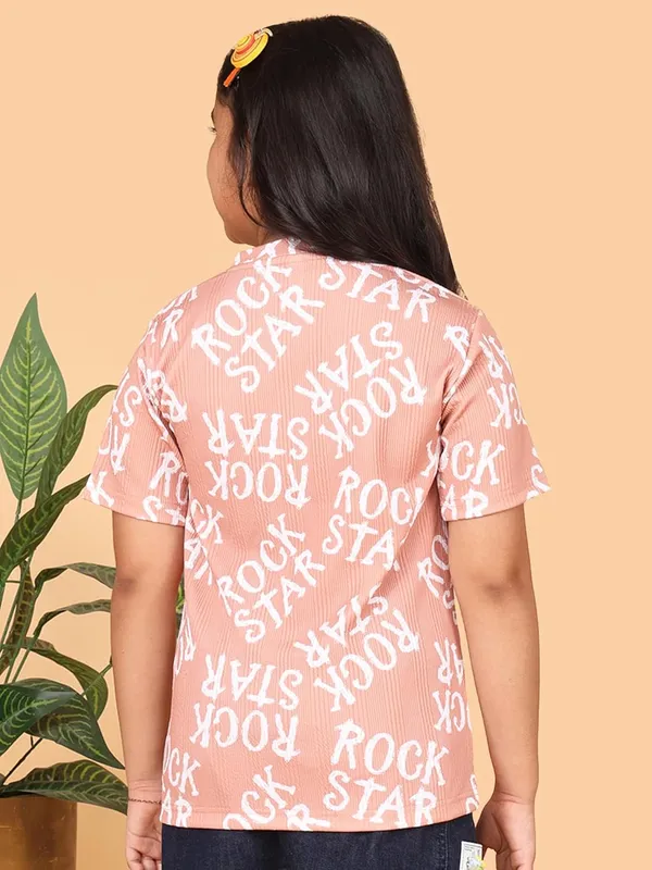 Peach_Cotton_Rock_Star_Print_Half_Sleeve_Round_Neck_T-Shirt,_Casual_Summer_Wear_For_Girls