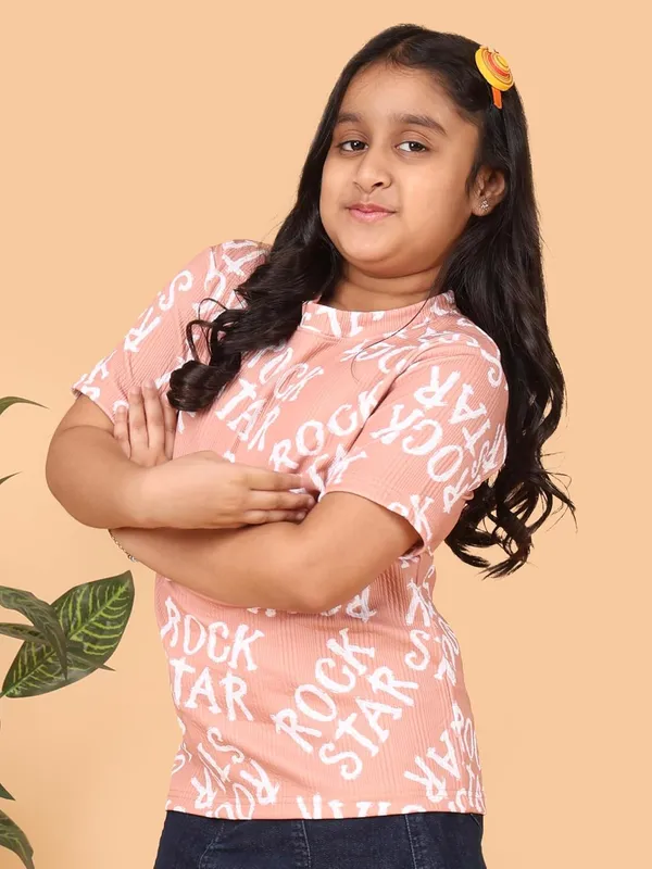 Peach_Cotton_Rock_Star_Print_Half_Sleeve_Round_Neck_T-Shirt,_Casual_Summer_Wear_For_Girls