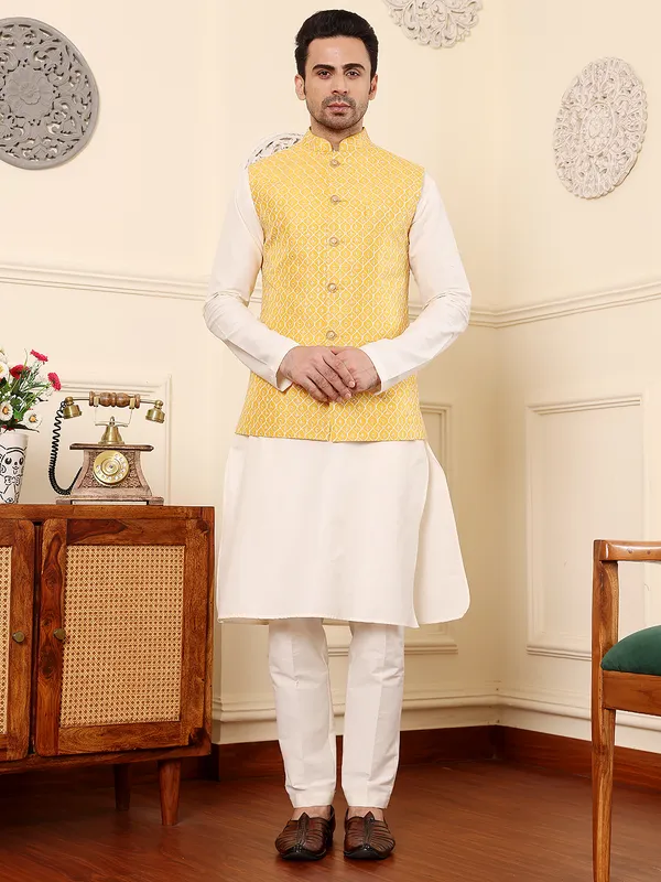 Men's_Ivory_Kurta_Pajama_&_Yellow_Embroidered_Nehru_jacket_(Set_of_3)